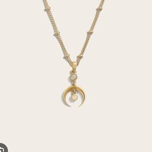 New awe inspired Gold Crescent Spike Opal amulet